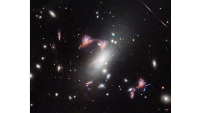 GALAXY VISIBLE THROUGH COSMIC MAGNIFYING GLASS EFFECT