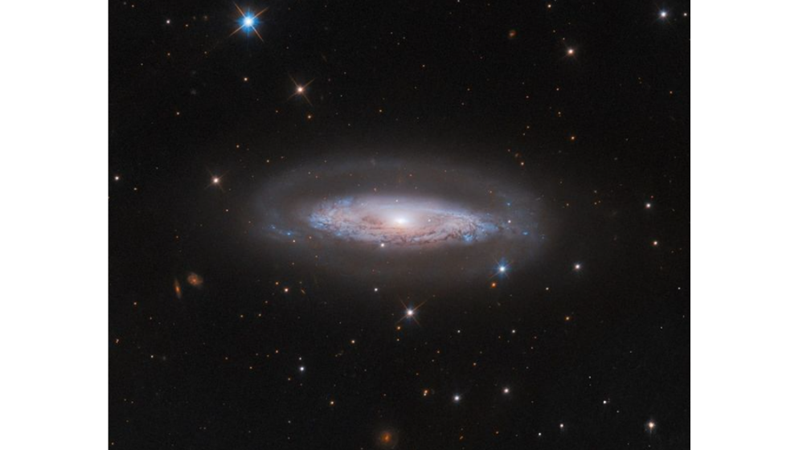GALACTIC DISC FILLED WITH STARS AND DUST LANES